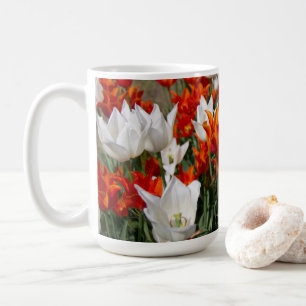 White and ginger tulips in the garden coffee mug