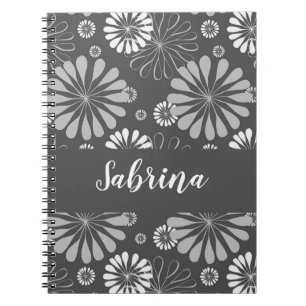 White and grey floral pattern notebook