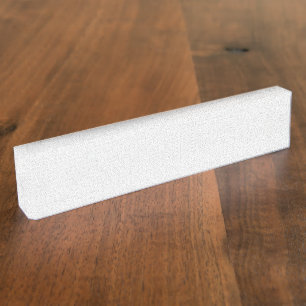 White and grey geometric pattern with interlocking nameplate