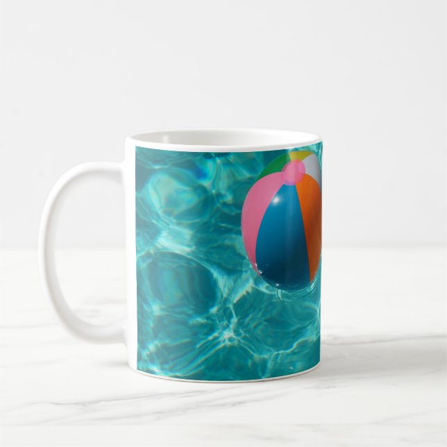 White and multicolored beach ball coffee mug (Left)