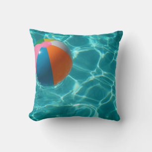 White and multicolored beach ball cushion