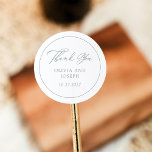 White and Sage Green | Italian Elegance Wedding Classic Round Sticker<br><div class="desc">These simple and elegant,  white and sage green wedding favour stickers feature classic,  old-world style with romantic calligraphy that says "thank you". Set the tone for your luxe,  sophisticated Italy inspired wedding with this classy,  minimalist design.</div>