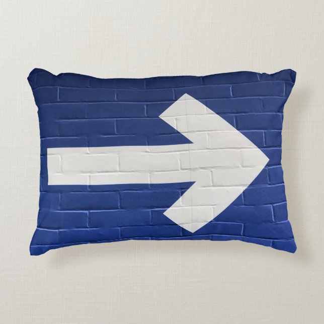 White arrow painted on brick wall decorative cushion (Front)