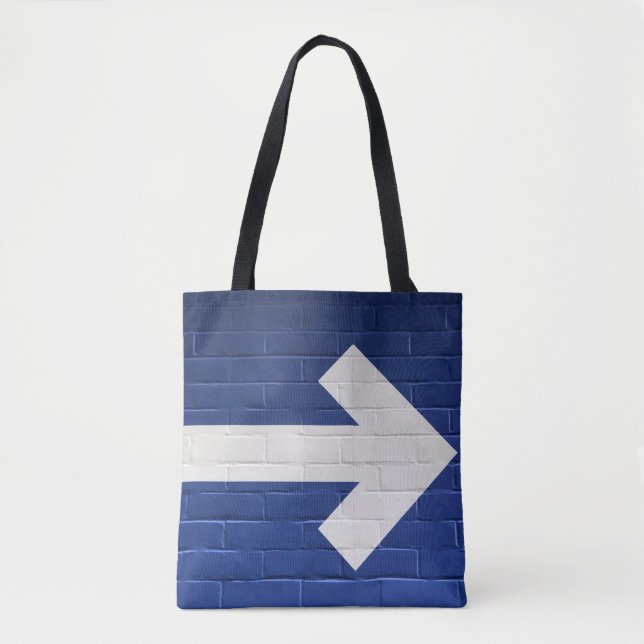 White arrow painted on brick wall tote bag (Front)