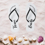 White Black Name Bride Bridal Party Bachelorette Flip Flops<br><div class="desc">A simple black and white minimalist typography design for a bridal shower, bachelorette party or beach wedding. The text is customisable and can be personalised with your own name and bride slogan. For example, Bride Squad instead of Team Bride, Bride repeated on the left and right foot, or something else....</div>