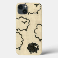 White & Black Sheep on Cream Background