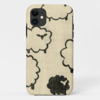 White & Black Sheep on Cream Background