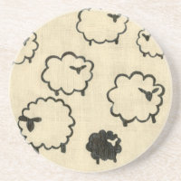 White & Black Sheep on Cream Background