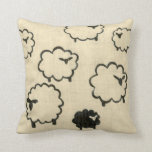 White & Black Sheep on Cream Background Cushion<br><div class="desc">Is your child having trouble sleeping? Have them count the white and black sheep in this print by Chariklia Zarris. A wonderful piece that is elegant in its simplicity. Order your print today!</div>