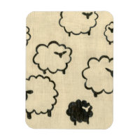 White & Black Sheep on Cream Background