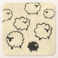 White & Black Sheep on Cream Background