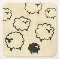 White & Black Sheep on Cream Background