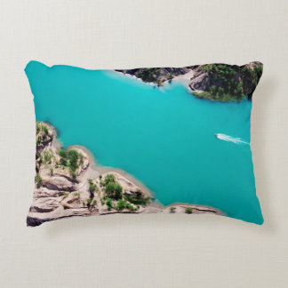 WHITE BOAT ON BLUE SEA WATER DURING DAYTIME DECORATIVE CUSHION