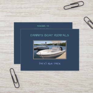 White boats in the marina boat rental business card