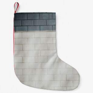 White brick wall small christmas stocking
