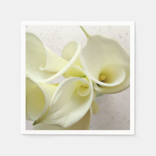 White calla lilies from above napkin