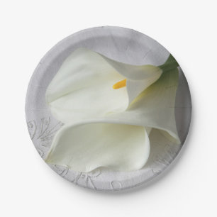 White calla lilies on linen paper plate