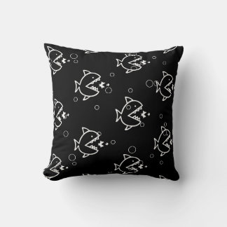 white CARTOON FISH on black pillow