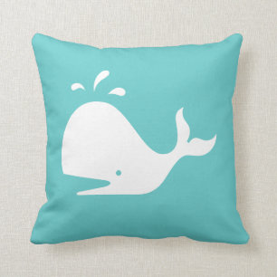 white CARTOON whale  on teal blue pillow