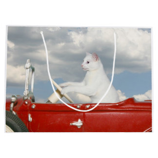 White cat drives a car large gift bag