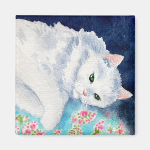 White cat on floral quilt magnet