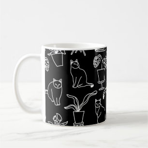 White cats on black coffee mug