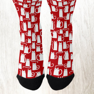 White Cats on Red Socks