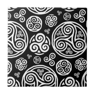 White celtic triskels on black tile