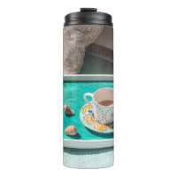 White ceramic mug on white serving tray