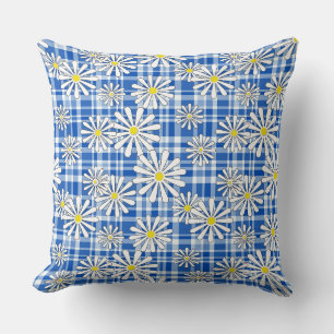 White chamomile flowers on a blue chequered backgr cushion