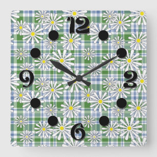 White chamomile flowers on a green blue checkered  square wall clock