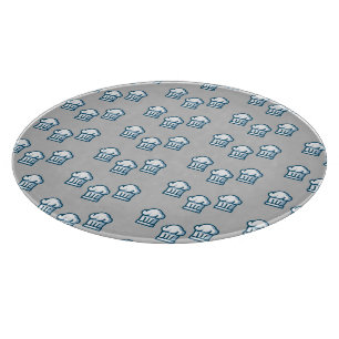 White chef hats on grey cutting board