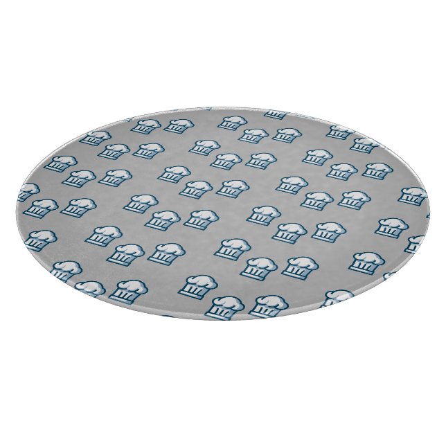 White chef hats on grey cutting board (Corner)