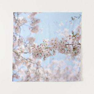 White cherry blossom under clear blue sky in the m tapestry