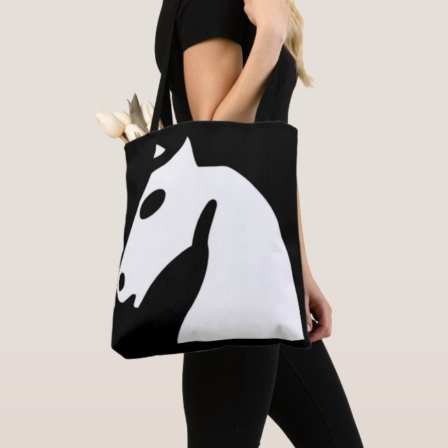 White chess horse on black tote bag (Close Up)