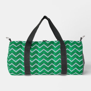 White chevron zigzag on textured green duffle bag