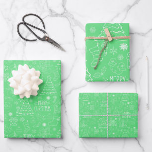 White Christmas Outlines on Green Wrapping Paper Sheet