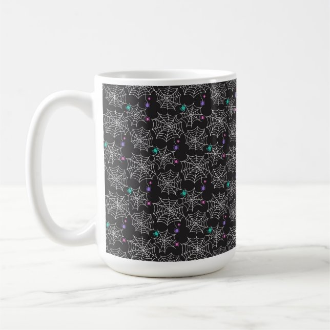 WHITE COBWEBS WITH PINK PURPLE GREEN SPIDERS COFFEE MUG (Left)