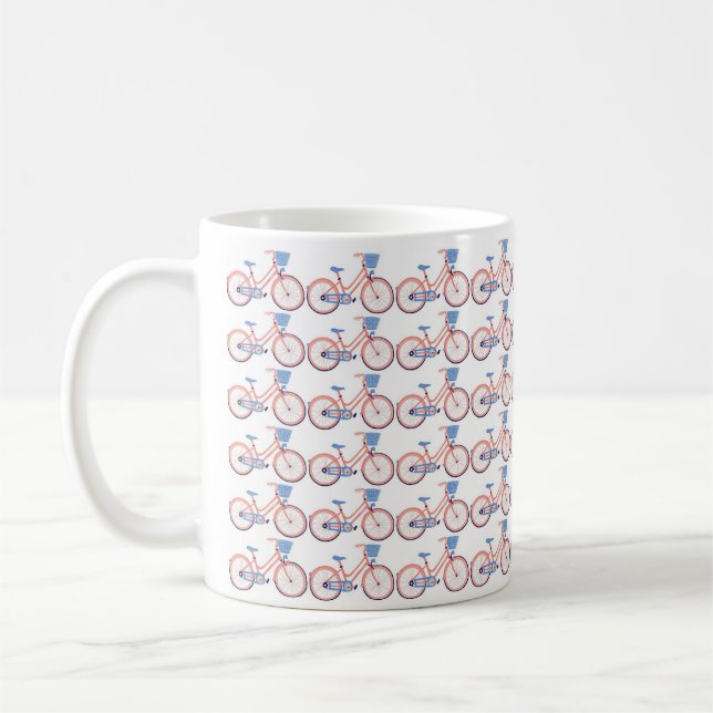 White coffee mug decorated with small bike  (Left)