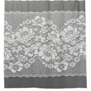 White colour straight strip of lace fabric on grey shower curtain