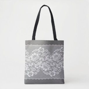 White colour straight strip of lace fabric on grey tote bag