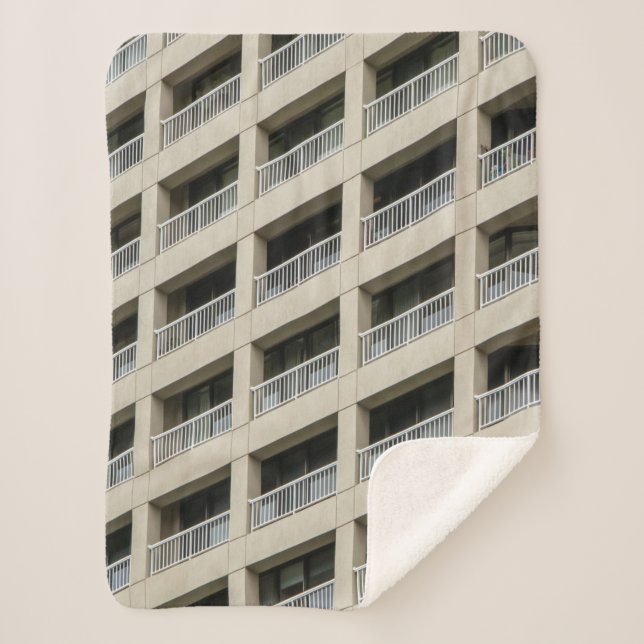 White concrete building during daytime sherpa blanket (Front)