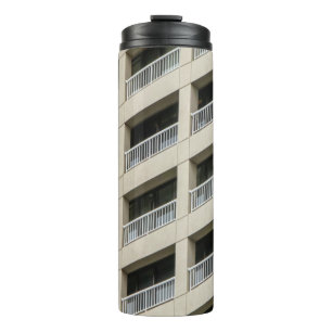 White concrete building during daytime thermal tumbler