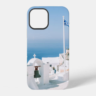 White concrete building near body of water in the iPhone 12 case