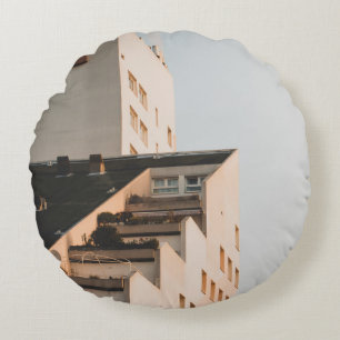 WHITE CONCRETE BUILDING ROUND CUSHION