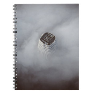 WHITE CONCRETE BUILDING SURROUNDED BY CLOUDS NOTEBOOK