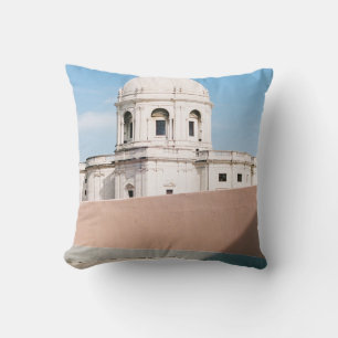 WHITE CONCRETE BUILDING UNDER BLUE SKY CUSHION