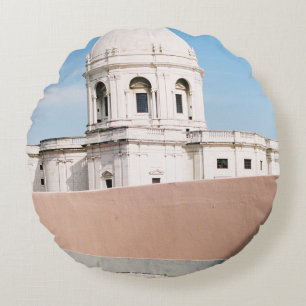 WHITE CONCRETE BUILDING UNDER BLUE SKY ROUND CUSHION