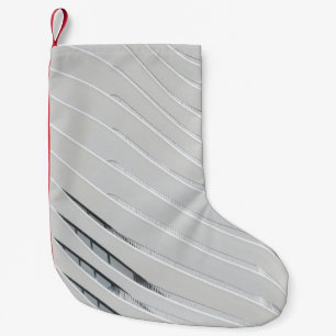 White concrete building wall small christmas stocking
