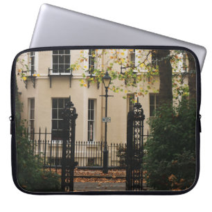 WHITE CONCRETE HOUSE SURROUNDED BY TREES DURING DA LAPTOP SLEEVE